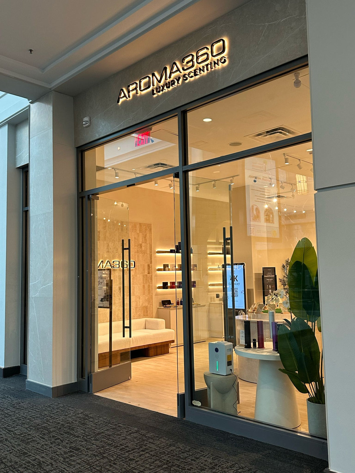 Aroma360's storefront at The Westchester Mall features glass windows and doors, allowing shoppers to view our products from the mall's hallway.